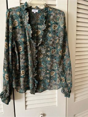 Silk blouse by GURU…
Teal Floral Ruffle Front Blouse